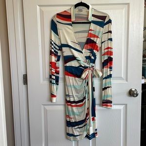 Multi colored, long sleeved dress by Maggie London.